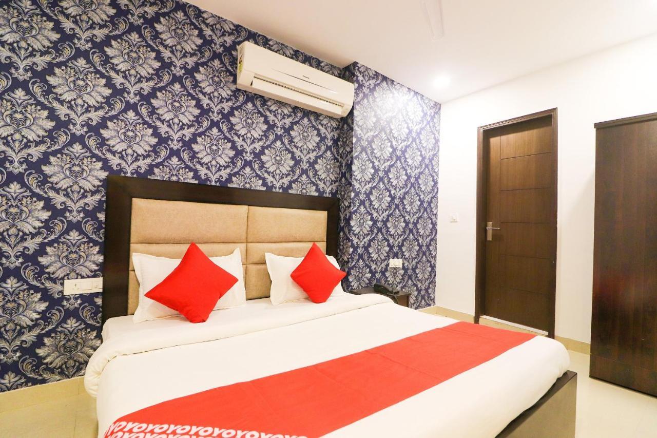 Oyo 63841 White Orchid Hotel Indraprast Bagian luar foto