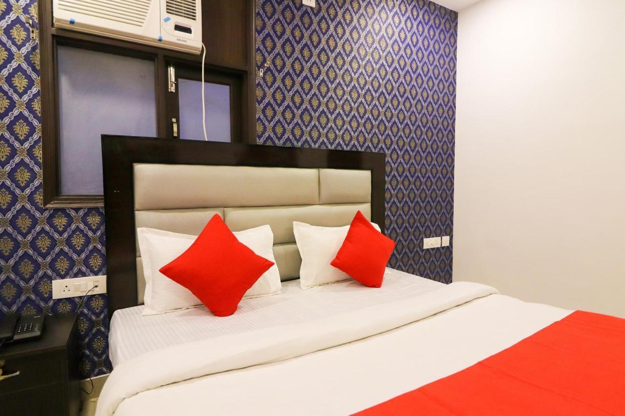 Oyo 63841 White Orchid Hotel Indraprast Bagian luar foto