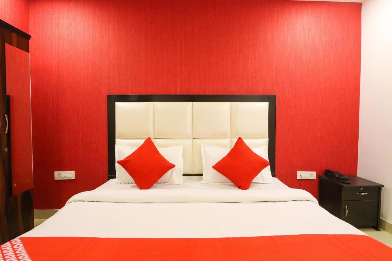 Oyo 63841 White Orchid Hotel Indraprast Bagian luar foto