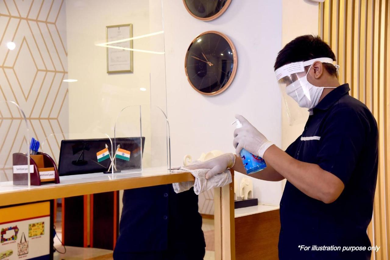 Oyo 63841 White Orchid Hotel Indraprast Bagian luar foto