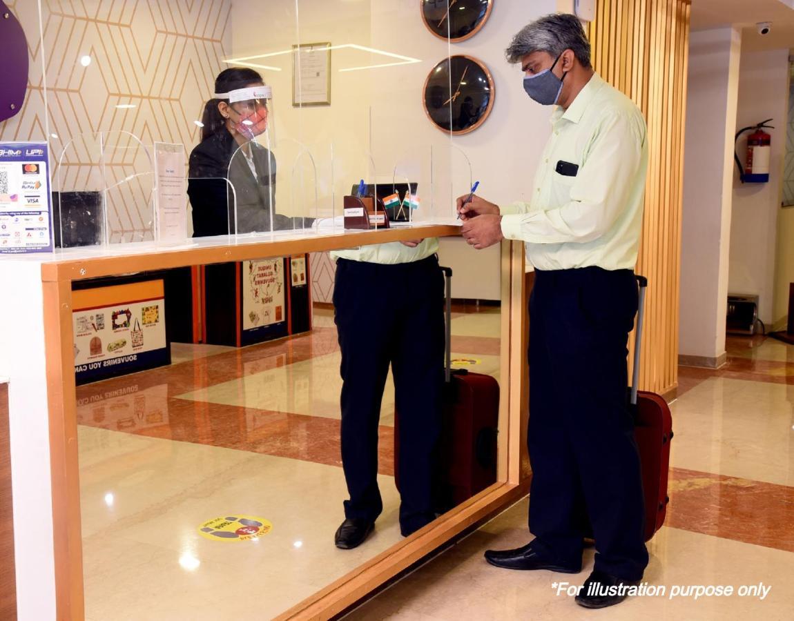 Oyo 63841 White Orchid Hotel Indraprast Bagian luar foto